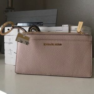 Michael Kors money bag. Wallet, cellphone holder